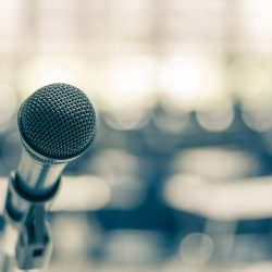 Microphone voice speaker in school lecture hall, seminar meeting room or educational business conference event for host, teacher or coaching mentor Microphone voice speaker in school lecture hall, seminar meeting room or educational business conference event for host, teacher or coaching mentor